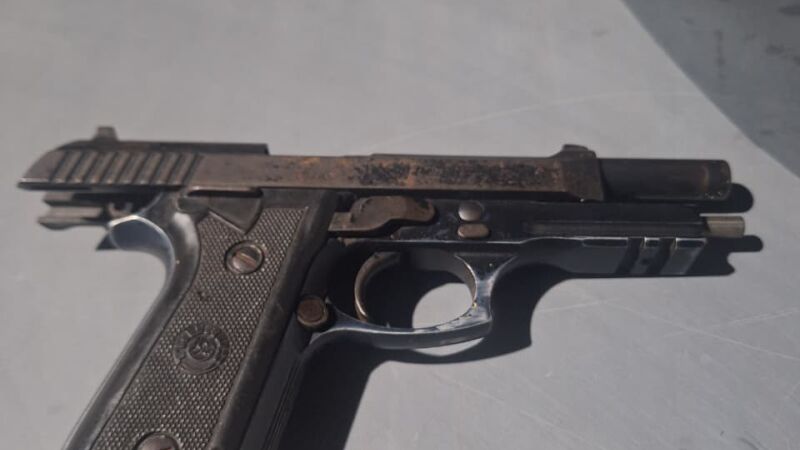 Arma usada durante o crime, uma Taurus, calibre .40