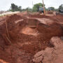 Chuva forte abre cratera em rua de Campo Grande