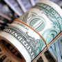 D&oacute;lar fecha praticamente est&aacute;vel, apesar de emprego mais fraco nos EUA