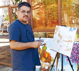 Hemerson utiliza a espátula como instrumento para suas artes